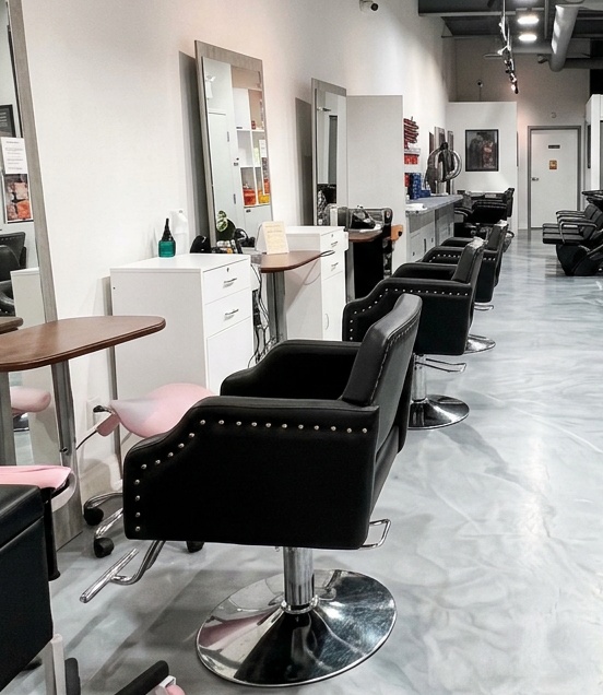 Haircut chairs and mirrors at FAME salon